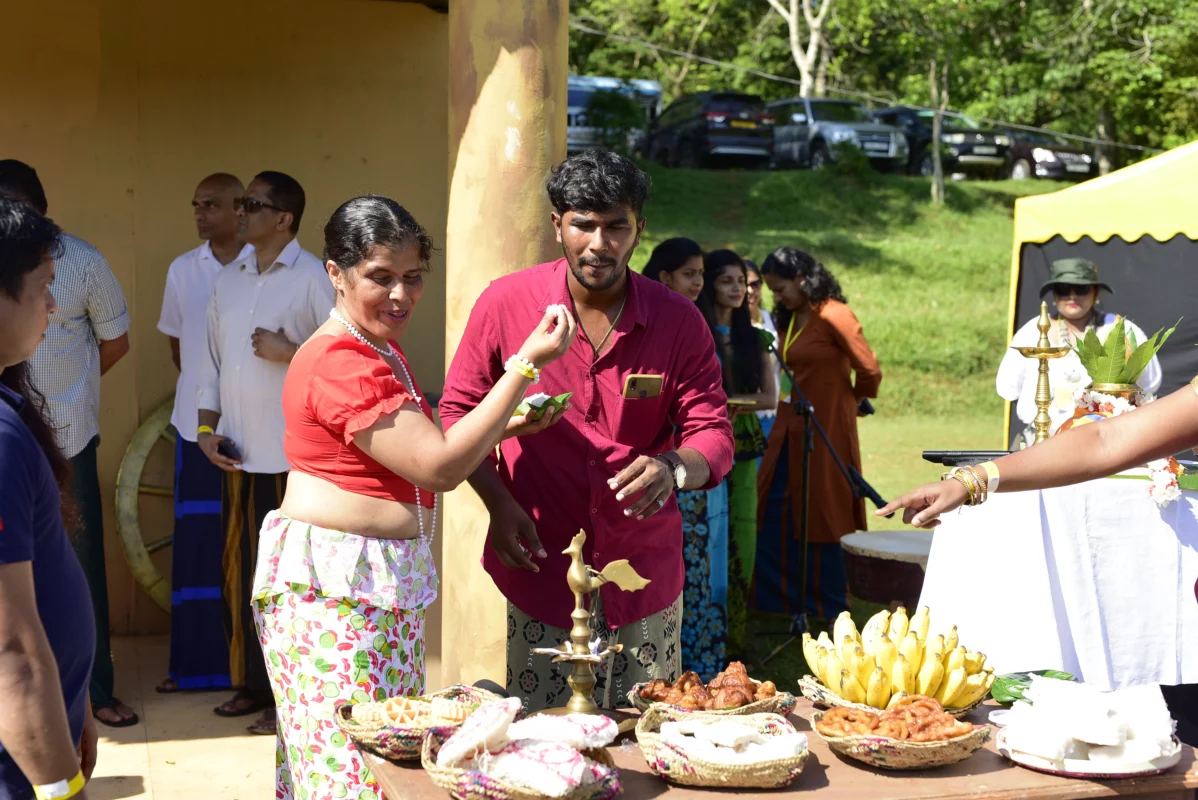 Employees enjoying the foods at aurudu celebrations